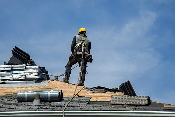 Professional Roof Replacement technician working in Adams, MA